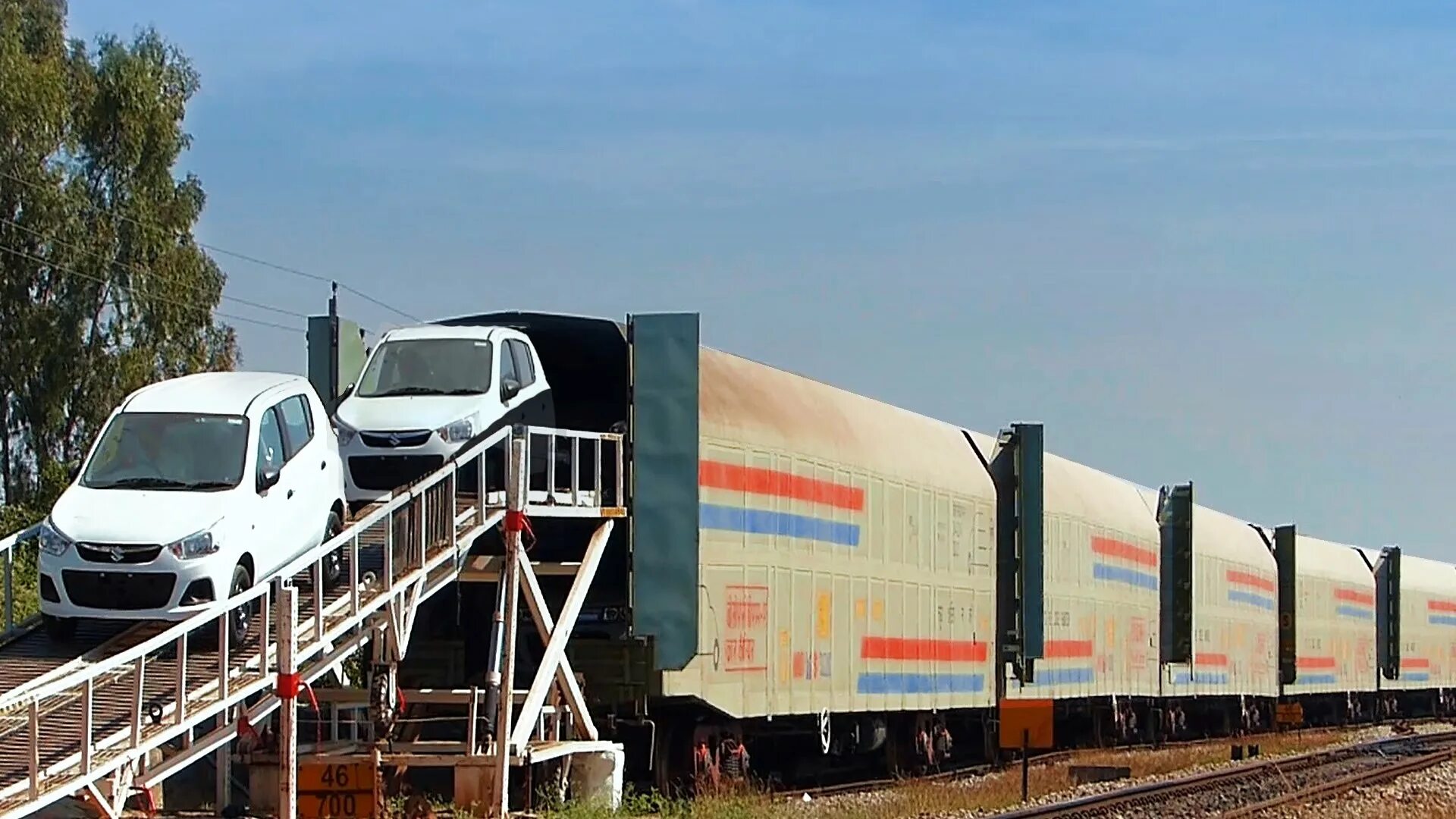 Get in the car train. Car carrier train. indian rail cargo. auto train. transport car in the train.