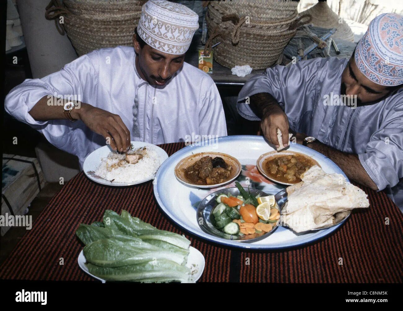 Muslim man eating.