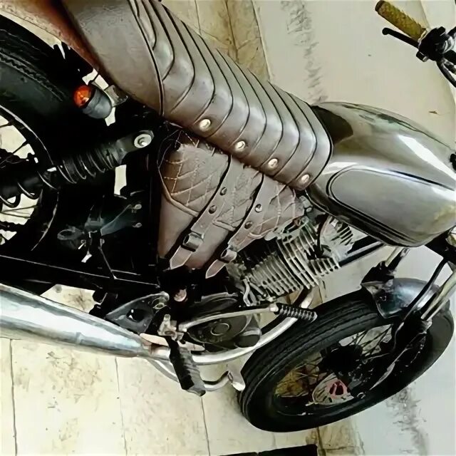 Side bags. Harley-davidson street 750 dark custom. Honda cbr repsol. Motorcycle side view. Motor side.