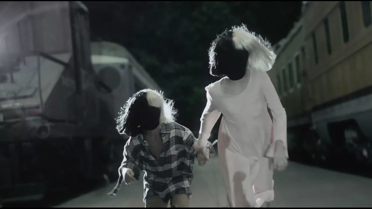 Say something loving. Never give up сиа. Невер ГИВ ап клип. Sia конвой. Sia альбом Lion.