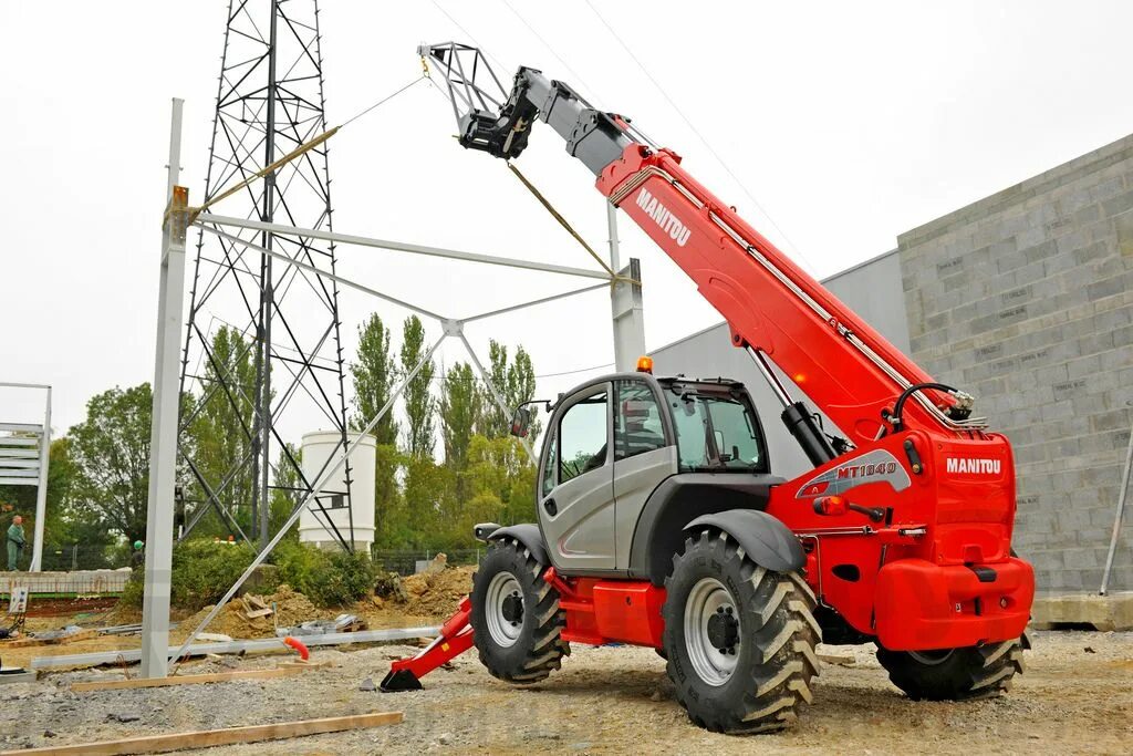 Куплю телескопический погрузчик б у. Телескопический-погрузчик Manitou MT 1840. Телескопический погрузчик Manitou 1840. Погрузчик строительный Manitou MT-X 1840. Погрузчик телескопический Manitou MT-X.