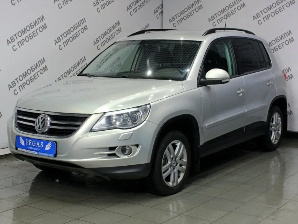 Фольксваген Тигуан 2.0 140 л.с дизель 2015. Серебряный Тигуан 2013 года. Volkswagen Tiguan 2014 легковой универсал серебристо-желтый. Volkswagen Tiguan i Рестайлинг 2.0d at (140 л.с.) 4wd серебристый с пробегом. Купить фольксваген в татарстане с пробегом