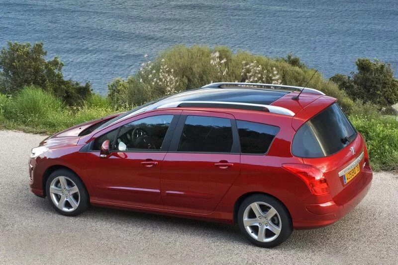 Купить пежо универсал. Peugeot 308 SW универсал. Пежо 308 универсал красный. Пежо 308 SW 2010. Пежо 308 SW красный.