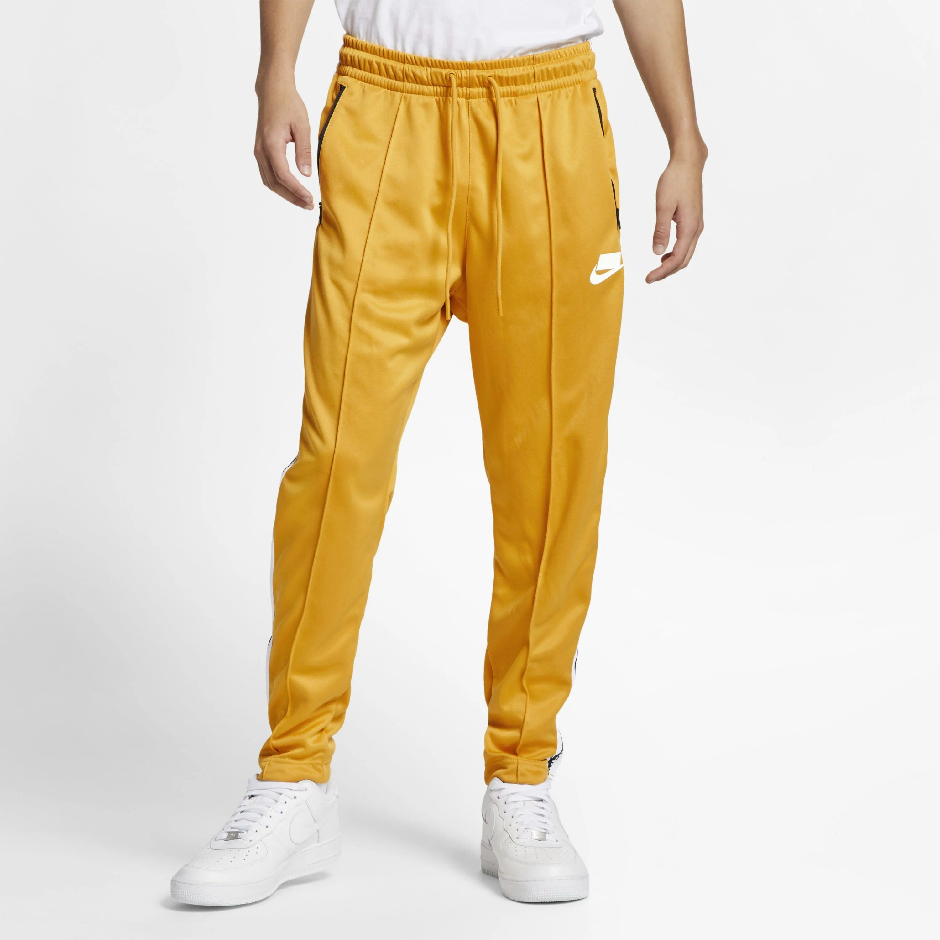 Nike Sportswear брюки мужские желтые. Nike Sportswear штаны мужские. Nike Sportswear NSW брюки. Мужские брюки Nike Sportswear track Pants. Желтые штаны мужские