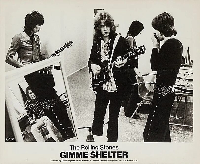 Stones gimme shelter. Роллинг стоунз 1969. Группа the Rolling Stones. 1970. Rolling Stones концерт 1970. Группа the Rolling Stones 1975.