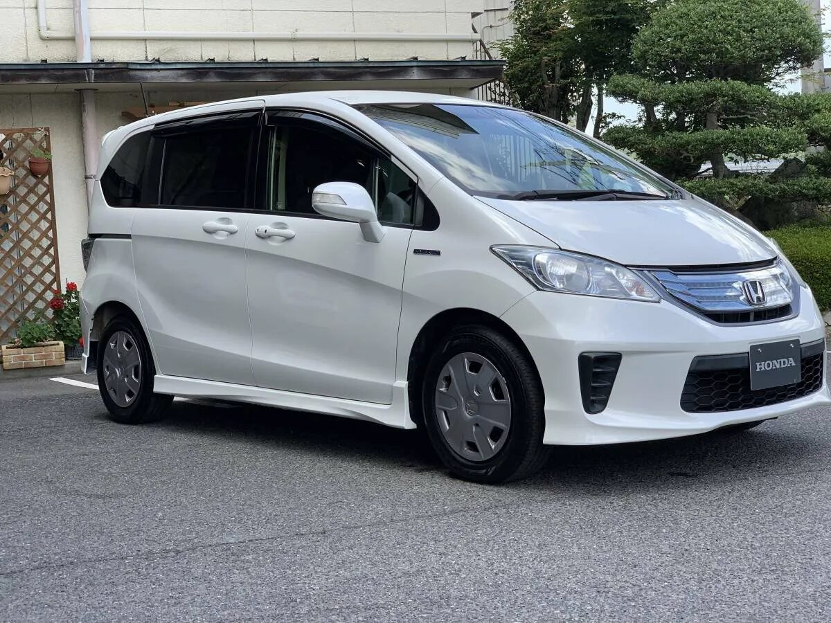 Хонда фрид 1 поколение. Honda freed Hybrid. Honda freed Hybrid 2018. Honda freed 2016. Honda freed 2022 гибрид.