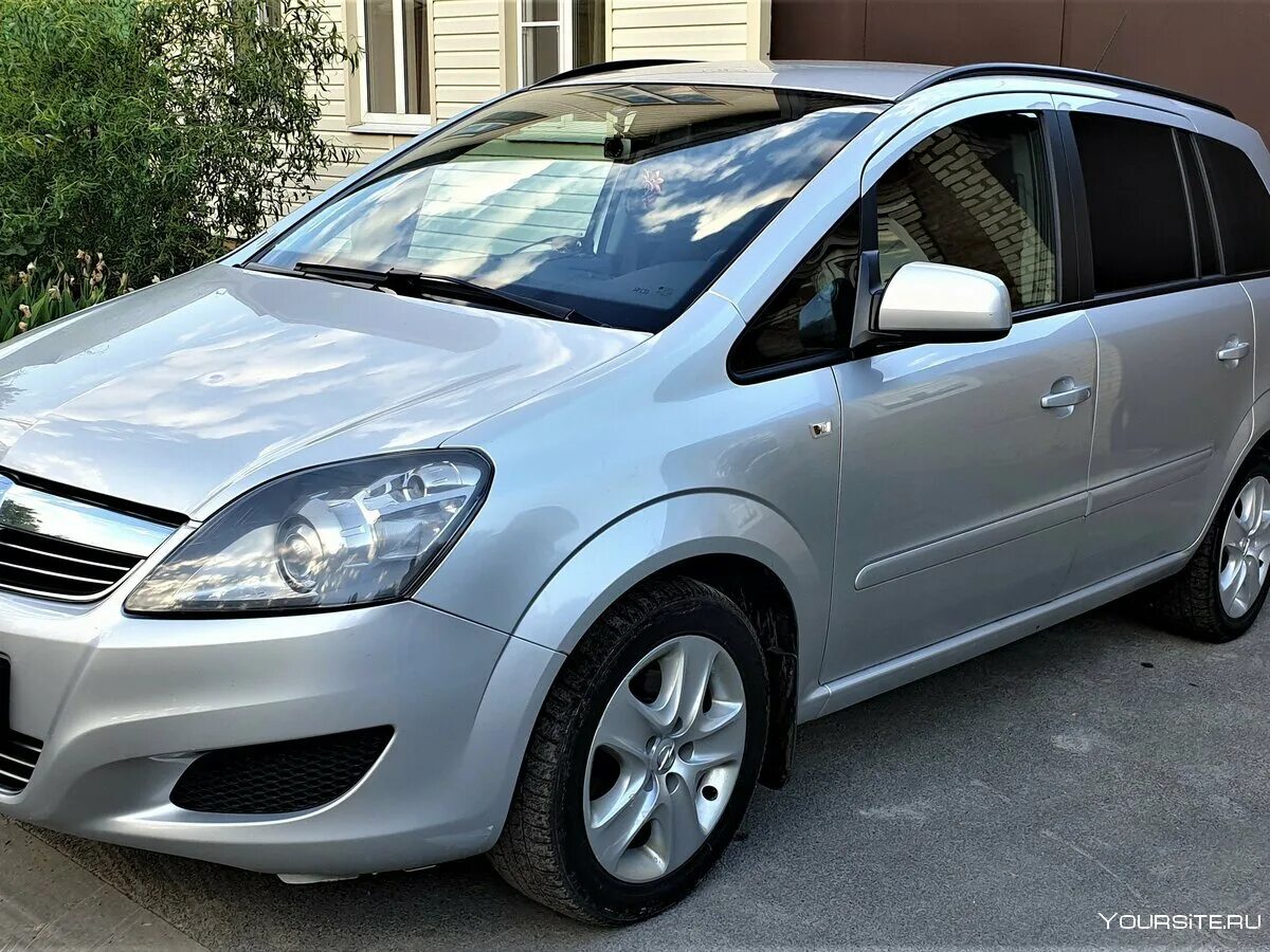 Зафира б видео. Opel Zafira 2012. Опель Зафира 2012. Opel Zafira b. Opel Zafira 2007.