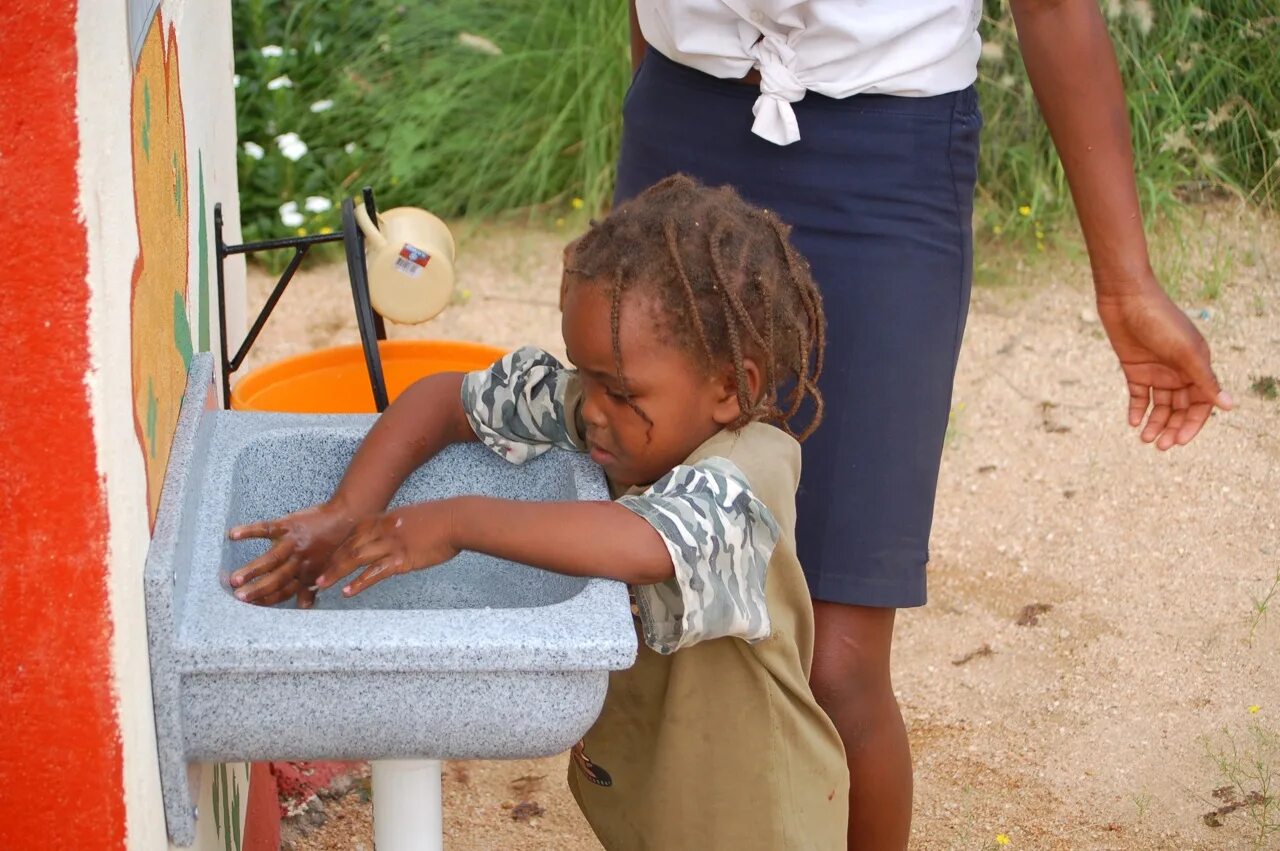 Child files. Children washing Cups. Reminder for a Kindergarten child on washing hands. Kids washing Fruit. Milk for children from Afar.