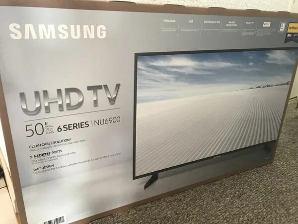 Размеры упаковки телевизора. UHD TV 50 коробка. Упаковка телевизора. Smart TV Samsung упаковка. Коробка от телевизора самсунг 50 дюймов.
