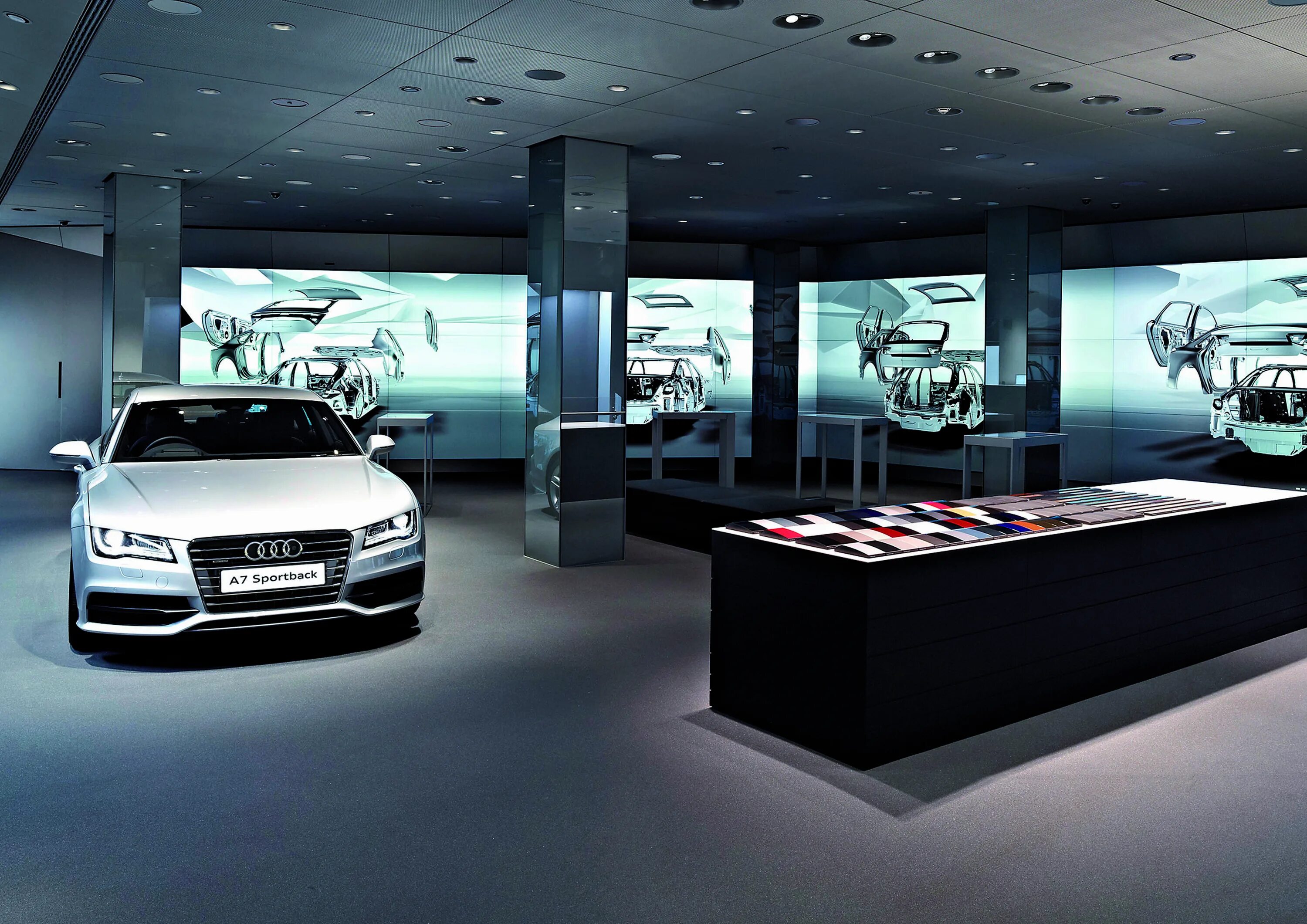 That is car in the shop. Audi Showroom. Шоу рум Ауди. Интерьер автосалона. Шоу рум автосалона.