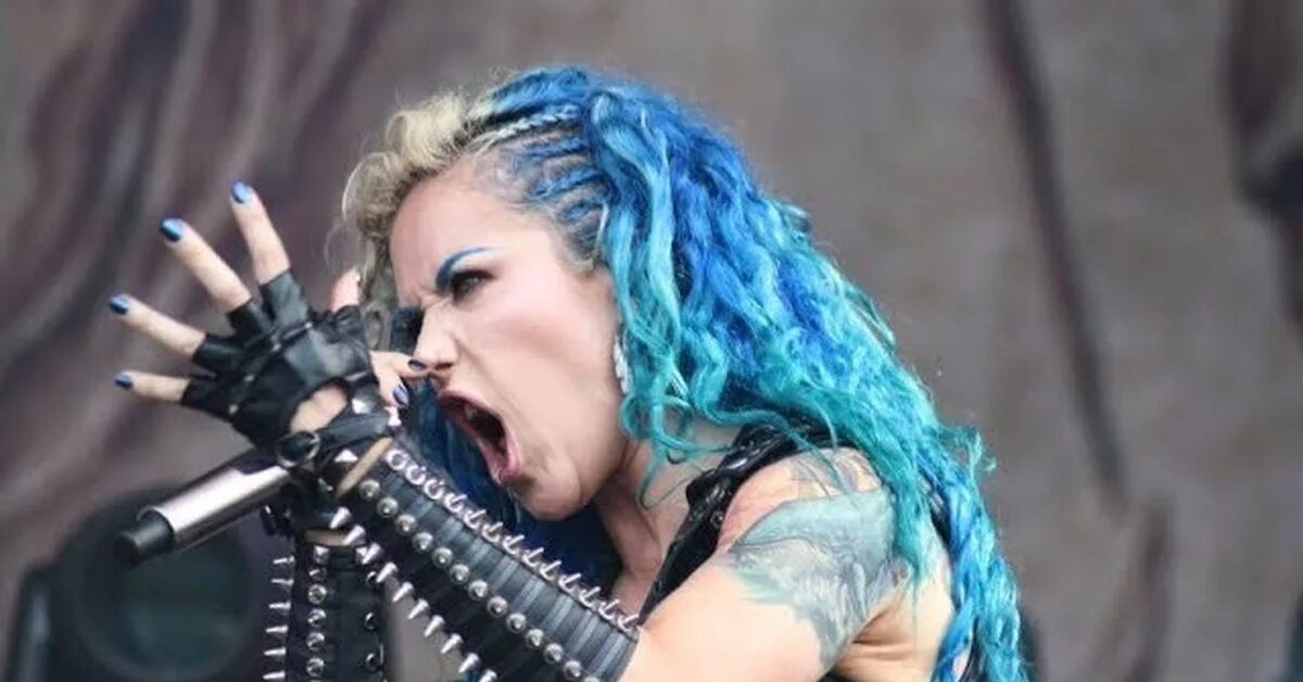 Arch enemy live. Группа arch enemy. Enemy imagine dragons. Arch enemy 2022 год фото. Enemy live.