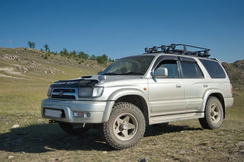 Хайлюкс сурф 185 купить. Toyota Hilux Surf 185. Toyota Surf 185. Hilux Surf 185. Багажник на Тойота Сурф 185.