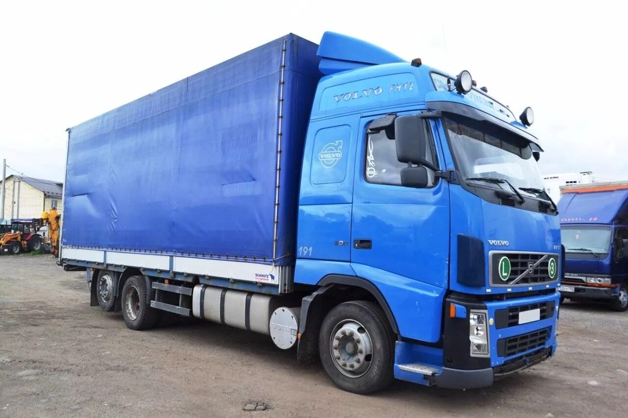 Машины грузовые б у. Грузовик Вольво 10 тонник. Грузовик бортовой Volvo FH 12. Volvo fh12 бортовой. Вольво fh12 одиночка тент.