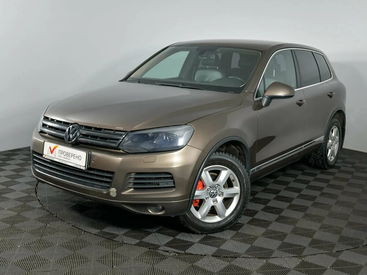 Volkswagen touareg 2011. Фольксваген Туарег 2011. Фольксваген Туарег 2011 года. Туарег 2 коричневый. Туарег 2011г до Рестайлинг.