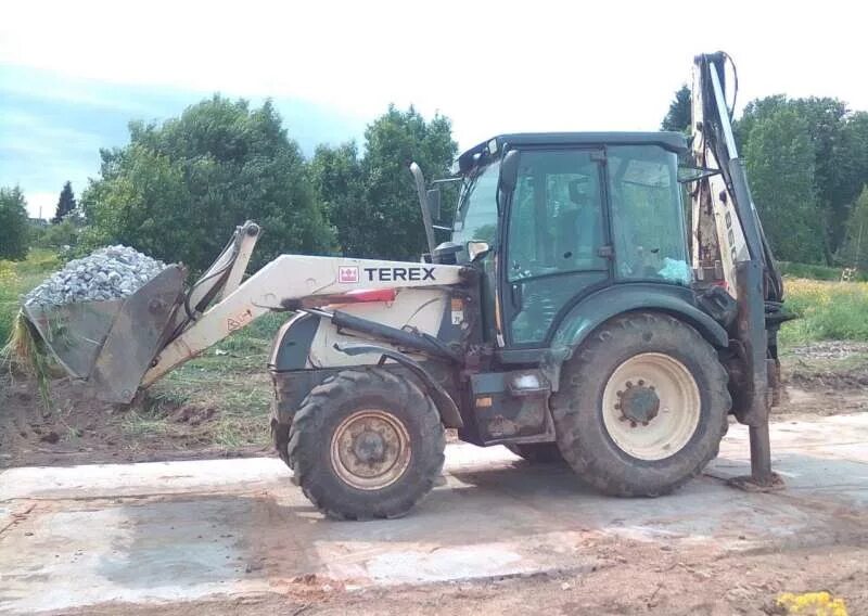 Экскаватор-погрузчик terex 970. Экскаватор терекс колесный. Терекс 840 экскаватор погрузчик. Трактор терекс 860. Тонированный трактор terex tlb 970.