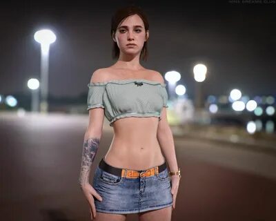 a woman with tattoos standing in the middle of a street at night wearing de...