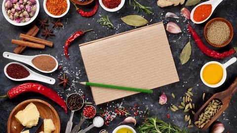 Essential Cooking Spices With Pen And Paper On Table Wallpaper. 