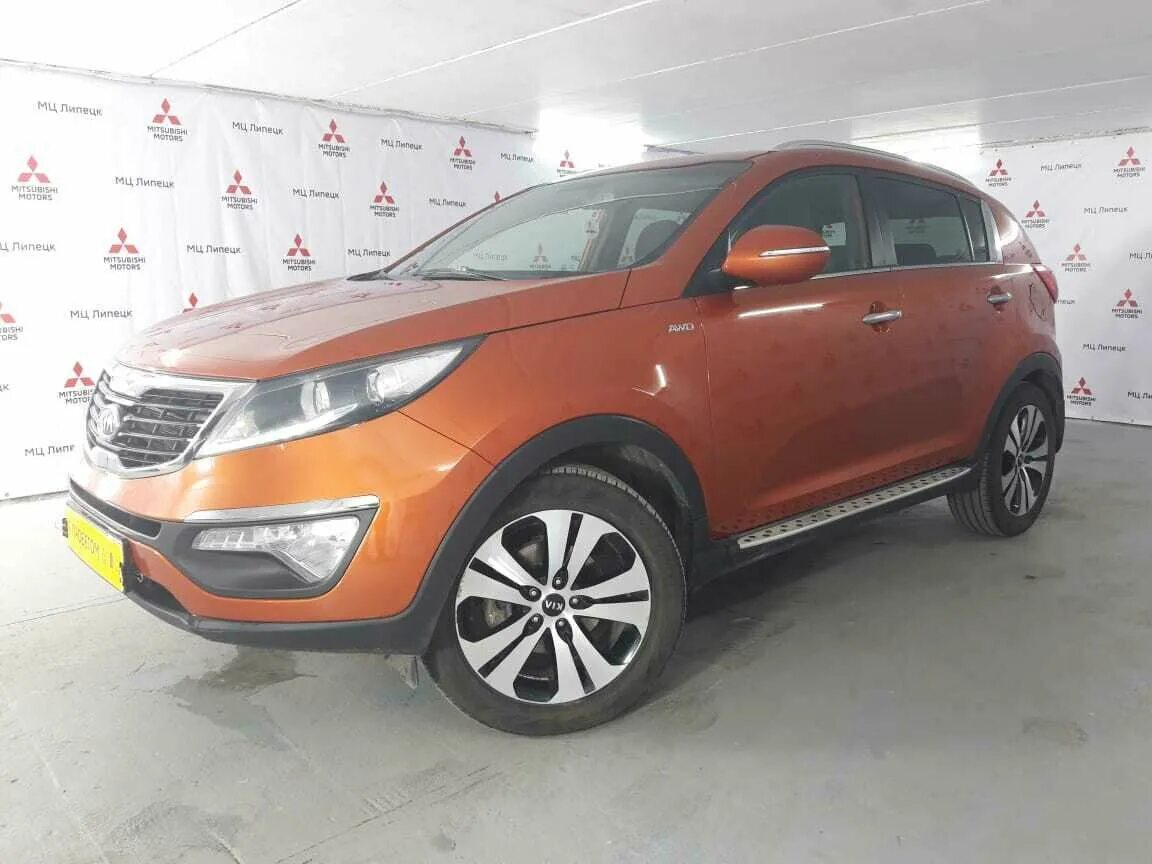 Купить киа спортейдж 3 дизель. Киа Спортаж 2012 оранжевый. Kia Sportage 3 с пробегом. Киа Спортейдж с пробегом в г Липецке. Фото кия спортейч оранжевая 2012 года в лесу.