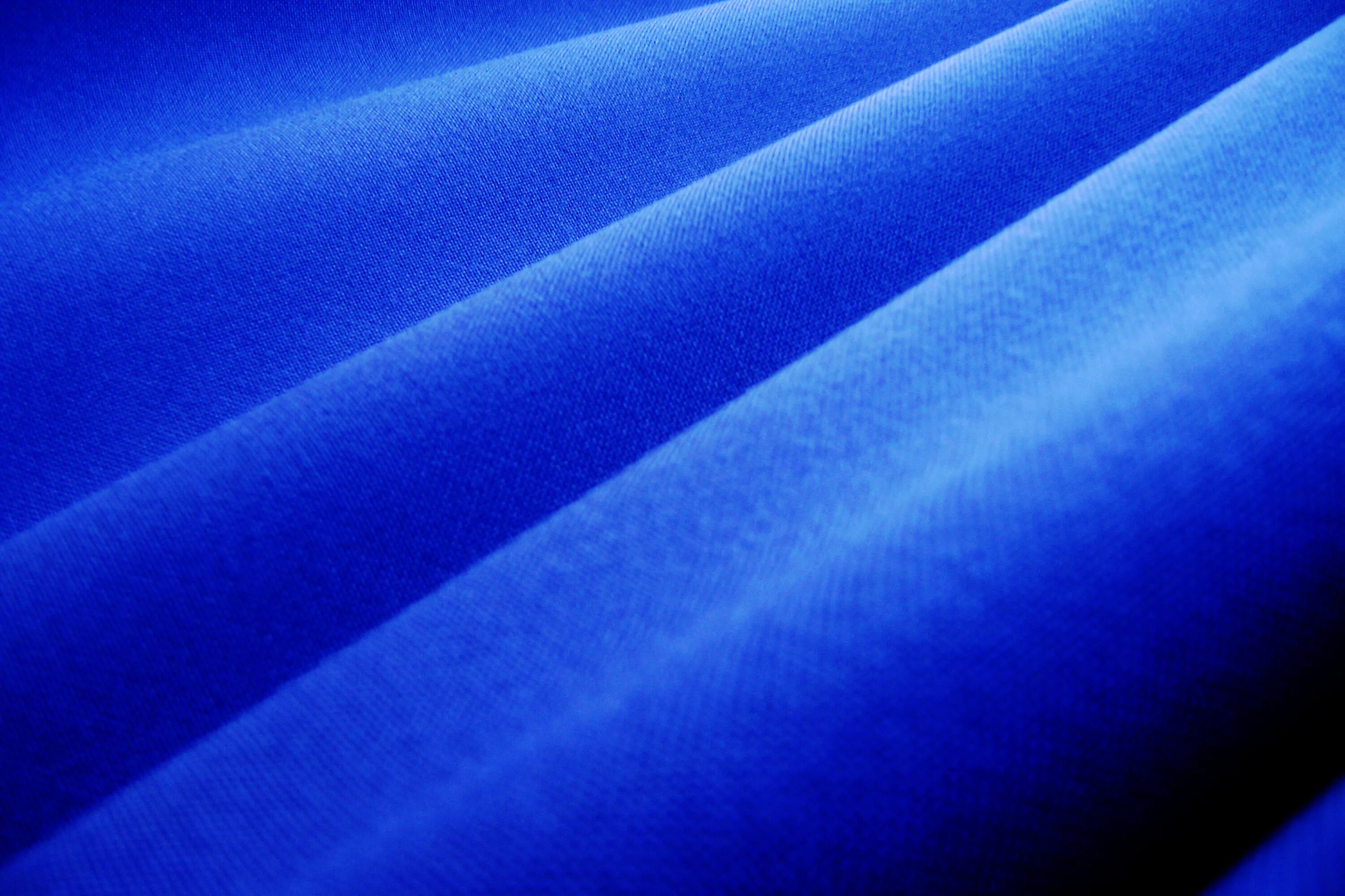 Ткань снизу. Синяя ткань. Синий материал. Фон ткань. Ярко синяя ткань.