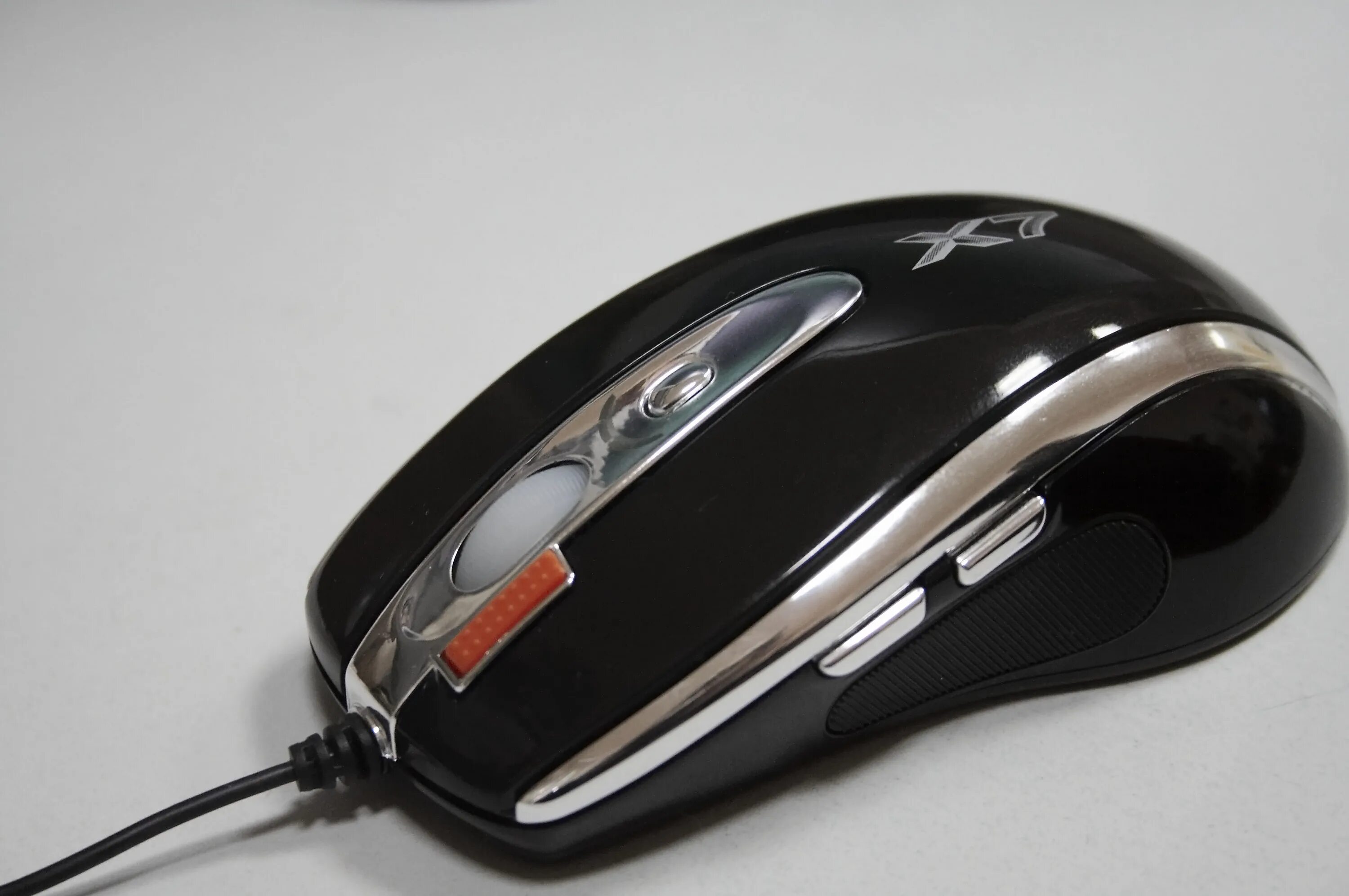 A4tech x87. Компьютерная мышка a4tech. a4tech x7. мышка x7 a4tech. x7 a4tech сбоку.
