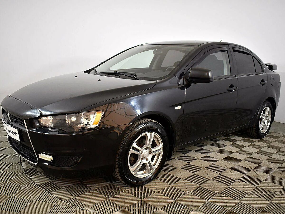 Митсубиси лансер 2010. Mitsubishi Lancer 2010 черный. Мицубиси Лансер 2010 года черная. Лансер 10 2010 года. Черный Митсубиси Лансер 2010 авто ру.