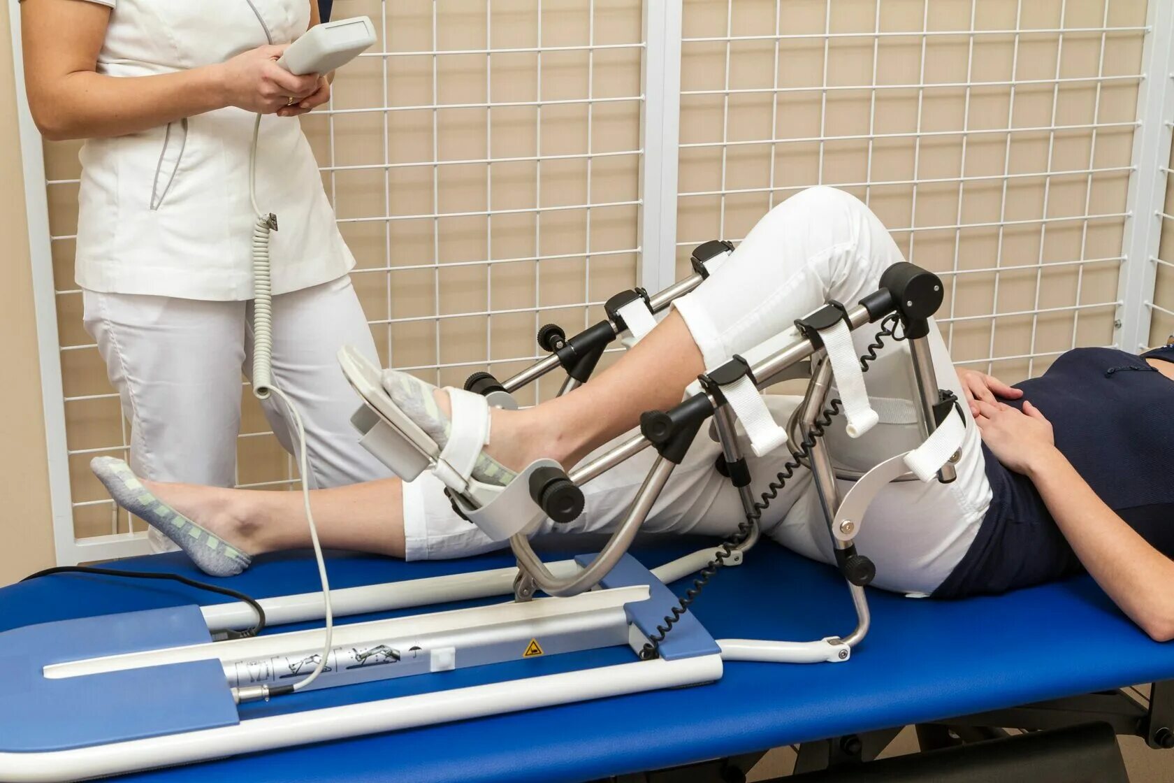 Механотерапия Артромот. Механотерапия для коленного сустава. Аппарат механотерапии Fisiotek 2000ts. Механотерапия в реабилитации.