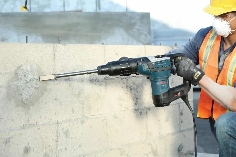 Перфоратор дерево. Перфоратор Bosch GBH 5-40 D professional 0611269020. Hammer Drill перфоратор. Сверлит бетон перфоратор. Сверление бетона дрелью.