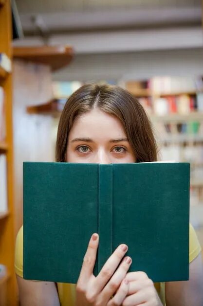 Лицо закрытое книгой. Подросток с книгой. лицо за книгой. девушка с книгой на лице. девочка подросток с книгой.