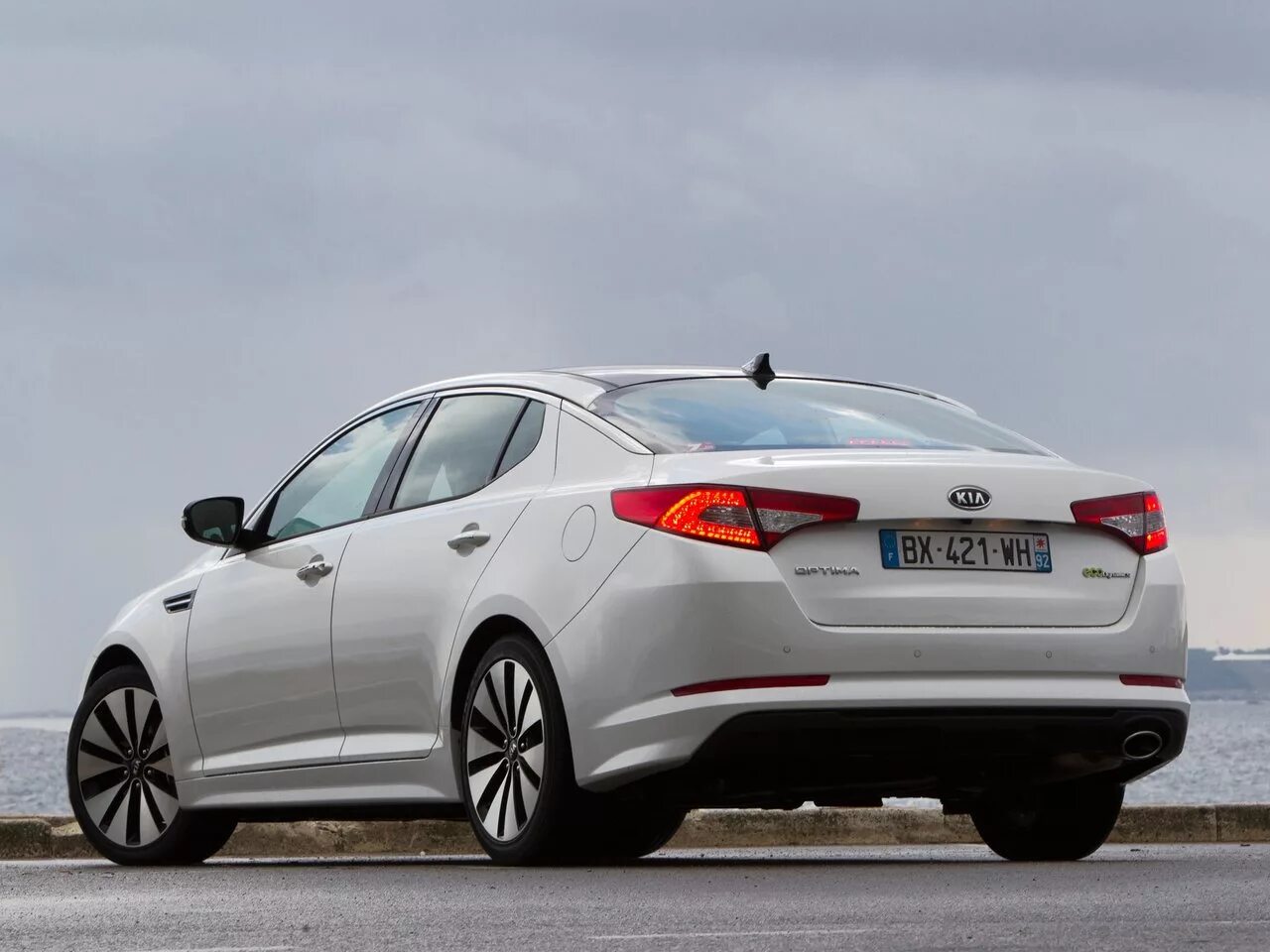 Optima est. Киа Оптима 2022. Kia Optima 2011. Kia Optima 3. Kia Optima III 2010.