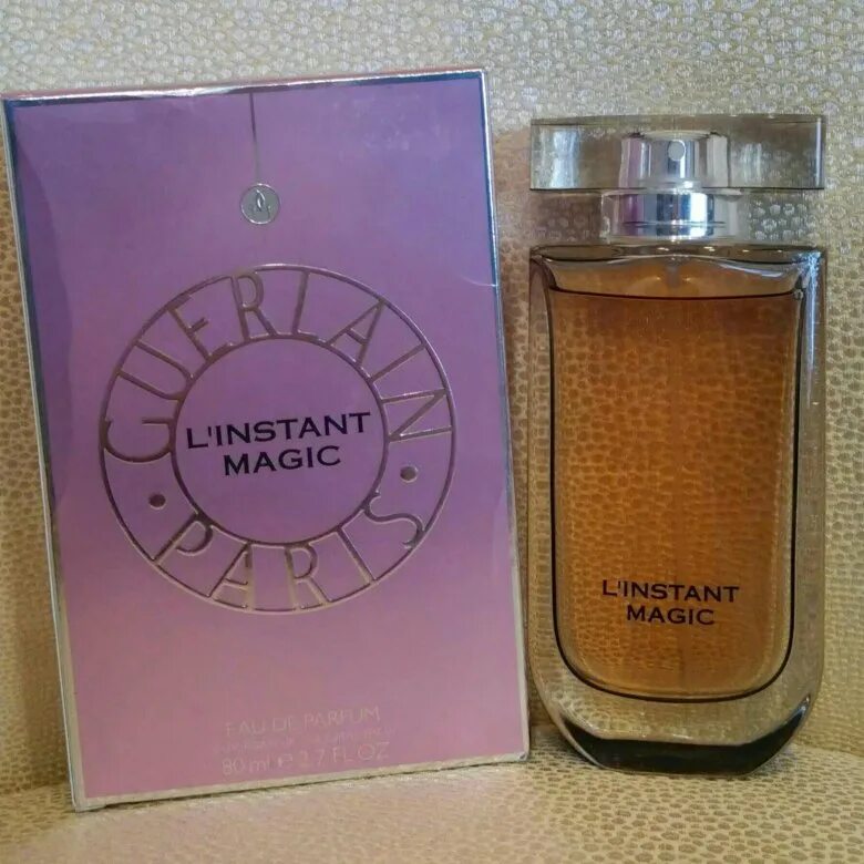 L instant magic. Линстант Мэджик. Герлен инстант Мэджик. Парфюм l instant Magic. Guerlain l'instant Magic в черной коробке.