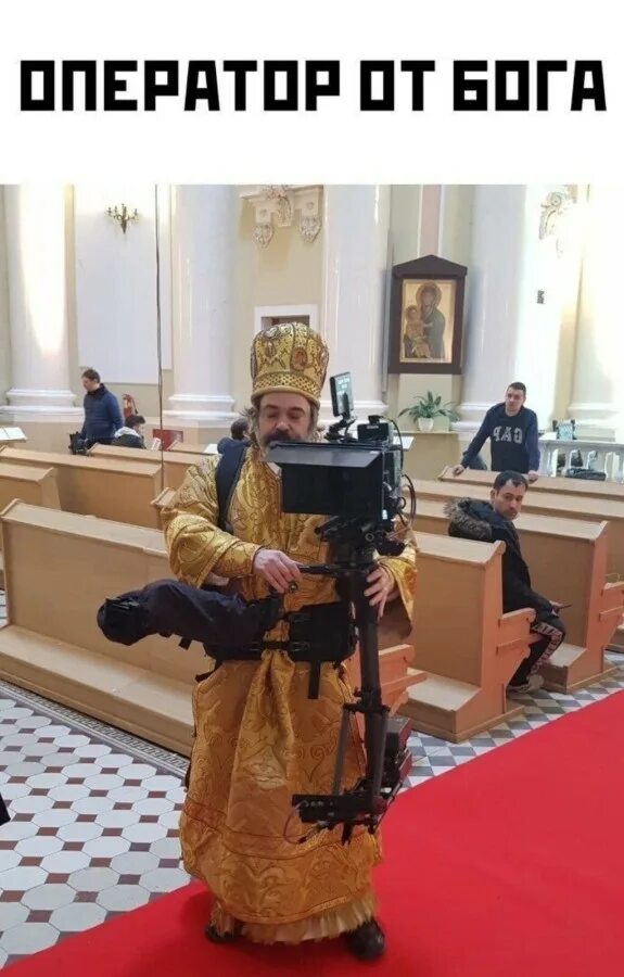 Оператор от бога. Батюшка с фотоаппаратом. священник с камерой. священник оператор.