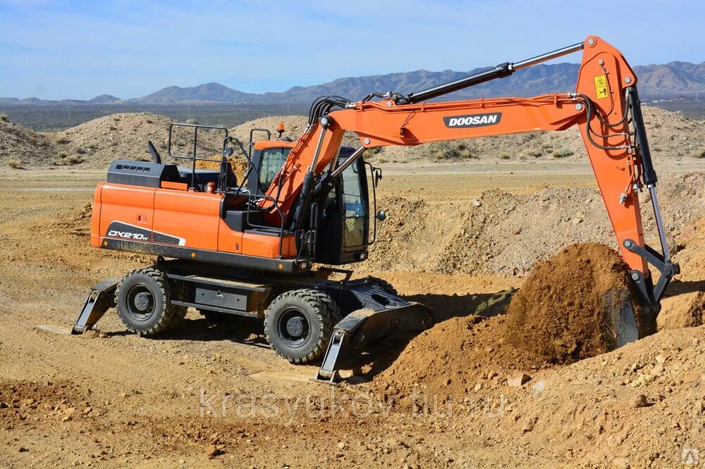 Экскаватор Доосан 210. Doosan dx210w. Полноповоротный экскаватор Doosan. Дусан 160 колесный экскаватор.