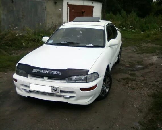 Тойота спринтер ае100 купить. Toyota Sprinter ае100. Toyota Sprinter ae100. Toyota Sprinter 100. Обвес Toyota Sprinter ae100.