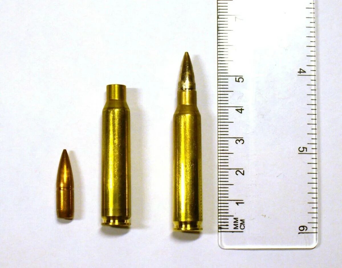 5 56 45 патрон. 5 56 Калибр. Калибр 5.56х45. Патрон 5.56 45 мм. Патрон НАТО 5.56х45.