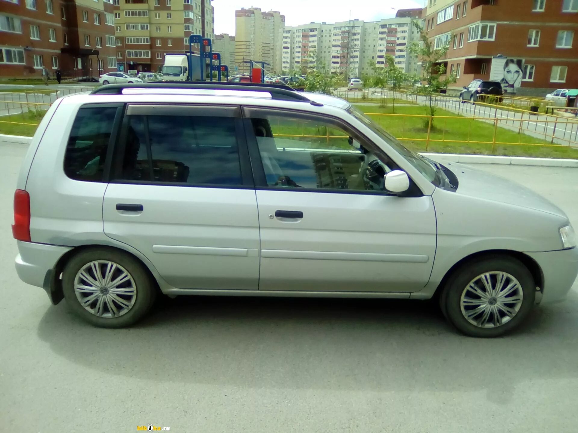 Мазда демио 1 поколение. Mazda Demio 1999. Тойота Демио 1999г. Демио 1999 фото. Тюнинг Мазда Демио 1999.