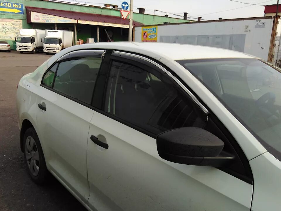 Дефлекторы окон skoda kodiaq. Ветровики рапид 2020. Дефлекторы окон шкода. Дефлекторы окон skoda rapid ii 2012 г. Дефлекторы окон шкода.