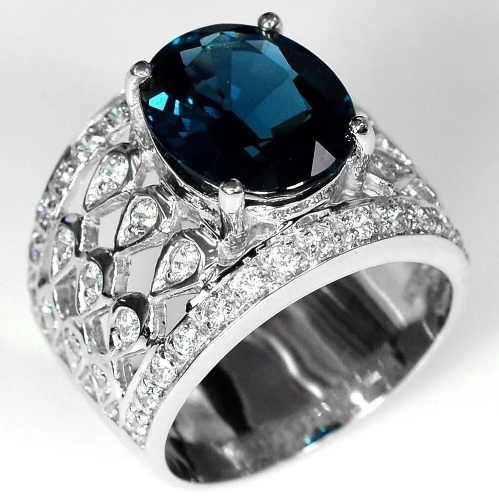 Купить женские кольца камнями. Топаз кабошон кольцо. Серебряное кольцо с крупным камнем. Перстень с синим камнем. Кольца с очень крупными камнями.