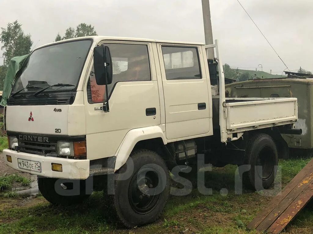 Mitsubishi Fuso 1990. Mitsubishi Canter 4x4 1990. Грузовик Митсубиси Фусо 1990. Мицубиси Кантер 1994.