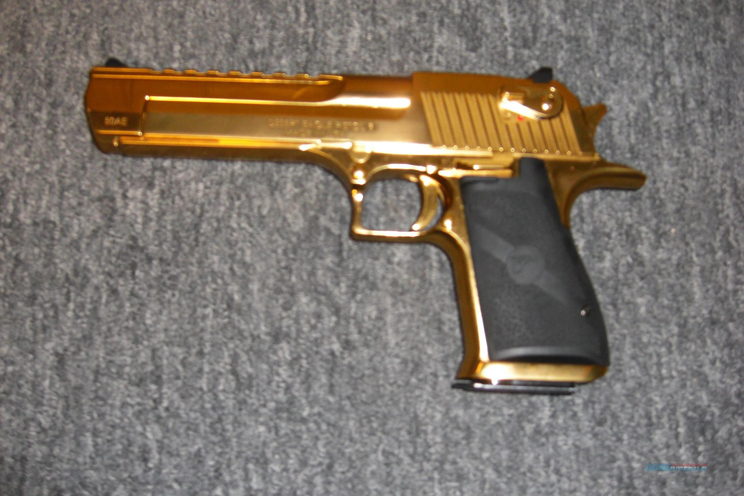 Grand power x-calibur 9x19. Desert eagle mark xix 50ae gold. Пистолет desert eagle 50. Titanium gun. Оружие из нитрид титана.