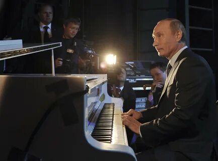 John playing the piano