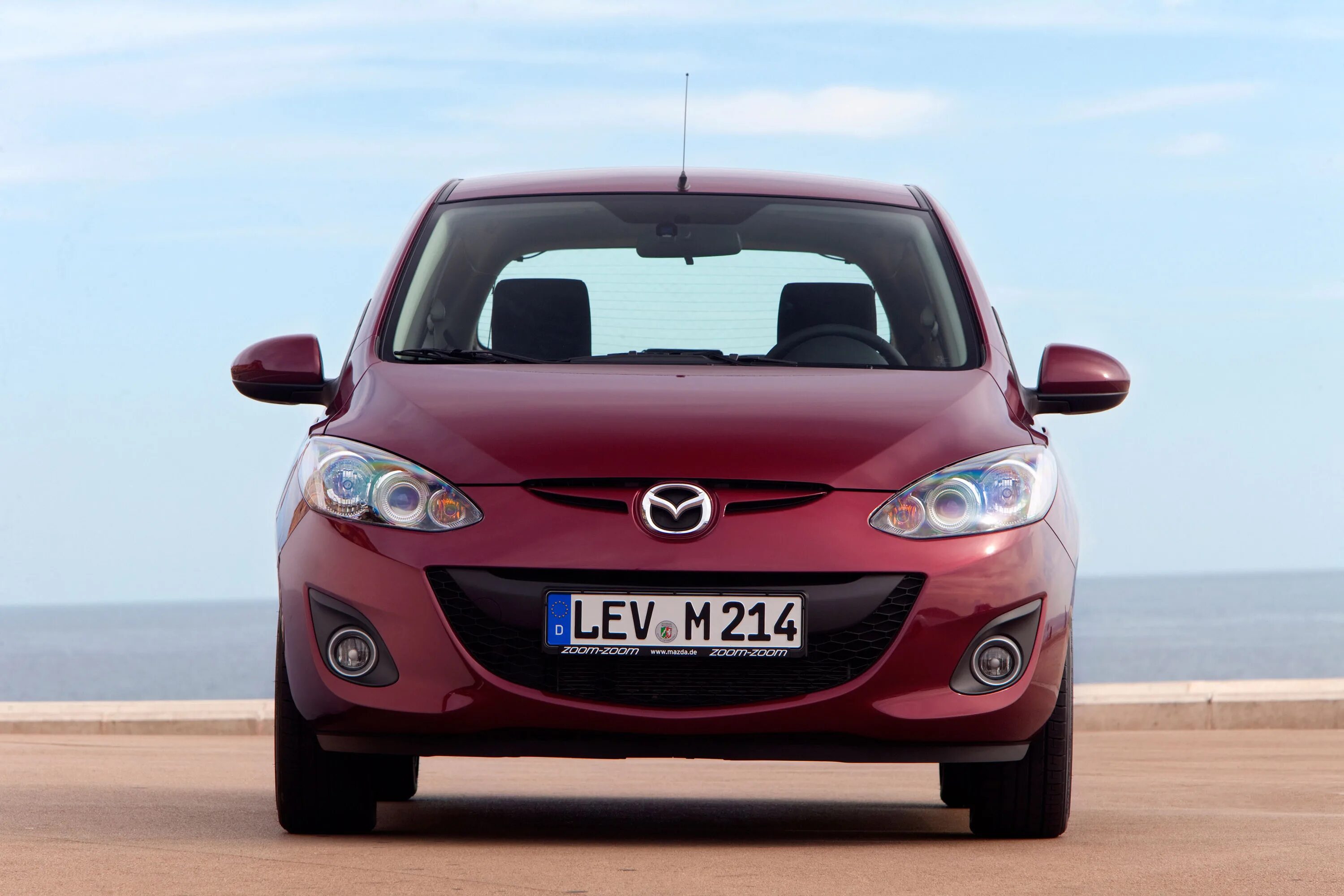 Мазда чей производитель. Mazda 2 3 Door. Мазда 2 2010. Mazda 2 de. Мазда сх2.