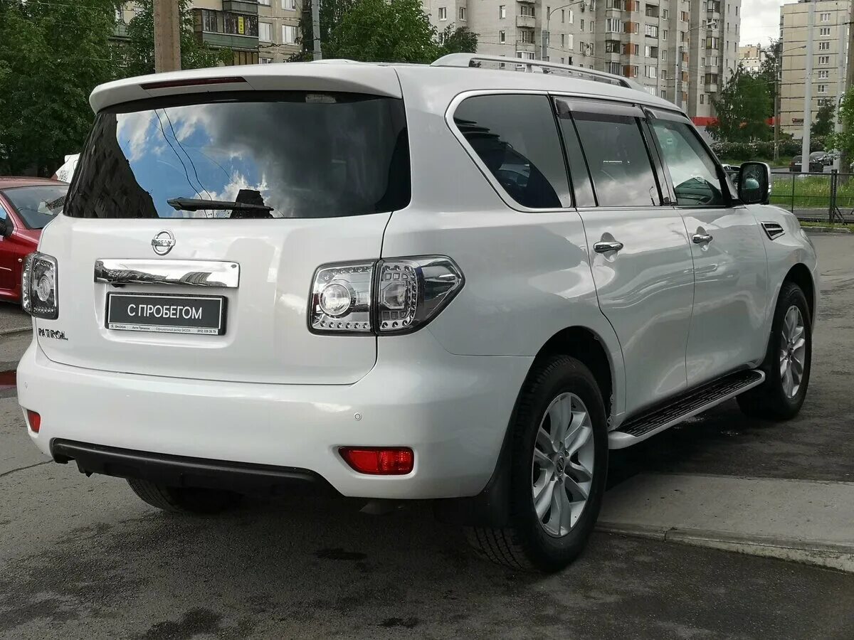 Купить ниссан патрол 62. Nissan Patrol y62 белый. Nissan Patrol y62 2011. Nissan Patrol 2011. Nissan Patrol vi (y62).