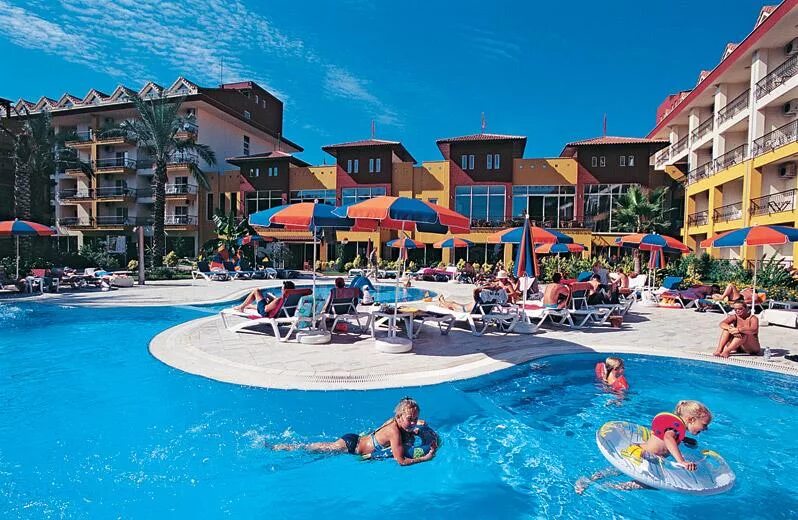 Турция отели village. Алатимия Виладж Кемер. Турция Кемер Alatimya Village Hotel. Отель в Турции Alatimya. Кристалл Аура Бич Резорт энд спа Кемер.