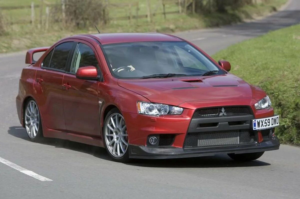 Купить mitsubishi lancer б у. Лансер Эво 11. Mitsubishi Lancer 1 поколение. Mitsubishi Lancer Evolution XI. Mitsubishi Lancer 2 поколение.