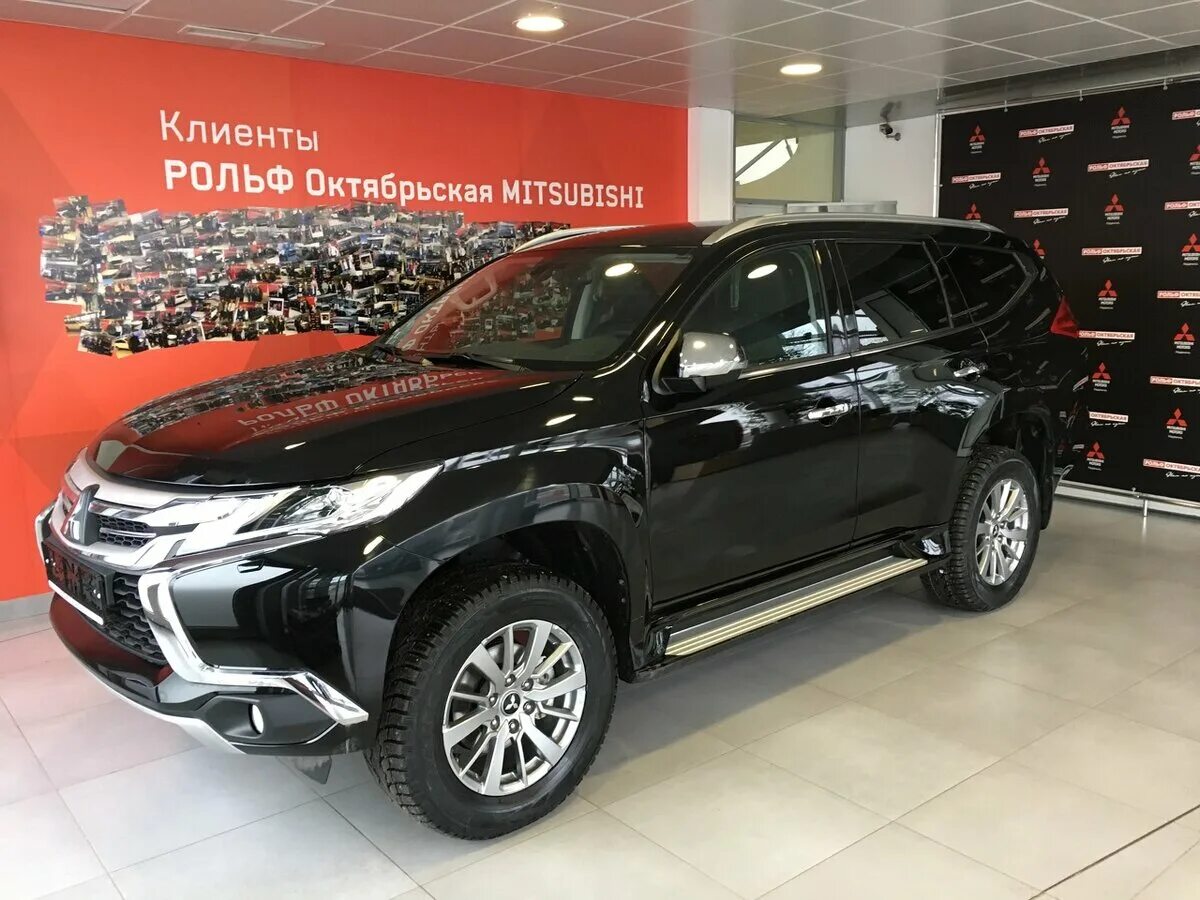 Mitsubishi Pajero Sport 2018. Mitsubishi Pajero Sport новый черный. Мицубиси Паджеро спорт РОЛЬФ. Новый Митсубиси Паджеро черный. Купить паджеро новый у официального дилера