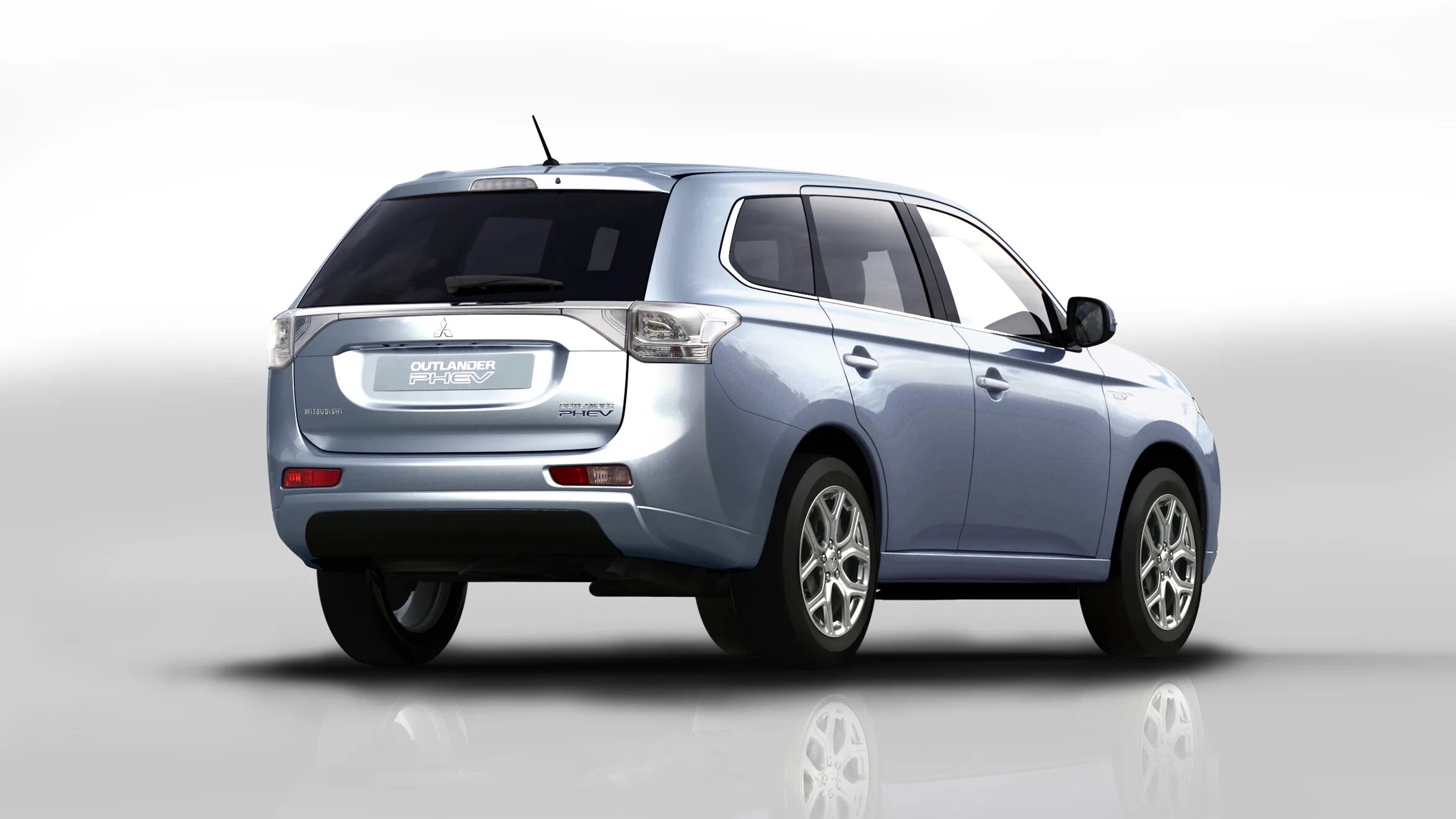 Phev гибриды. Мицубиси Аутлендер PHEV. Mitsubishi Outlander Hybrid 2013. Мицубиси Аутлендер гибрид. Plug in Hybrid Mitsubishi Outlander.