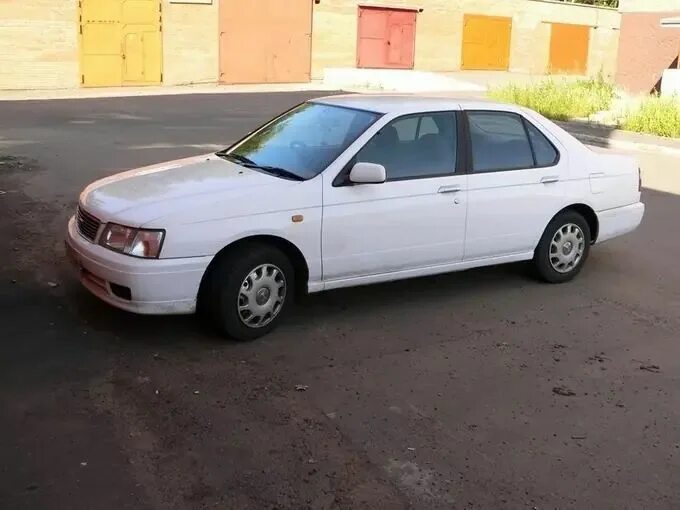 Nissan bluebird 1997 xi. Ниссан блюберд 1997. Nissan bluebird 2000 белый. Ниссан блюберд 1997 год. Nissan 97 год combi.