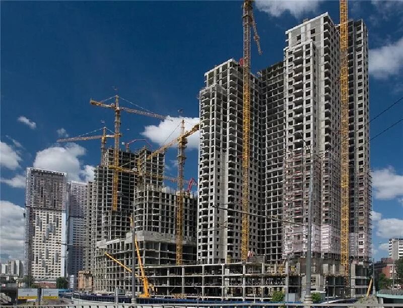 Недвижимость строительство в москве. Стройка фото. городское строительство. цифровая стройка. капитальное строительство домов.