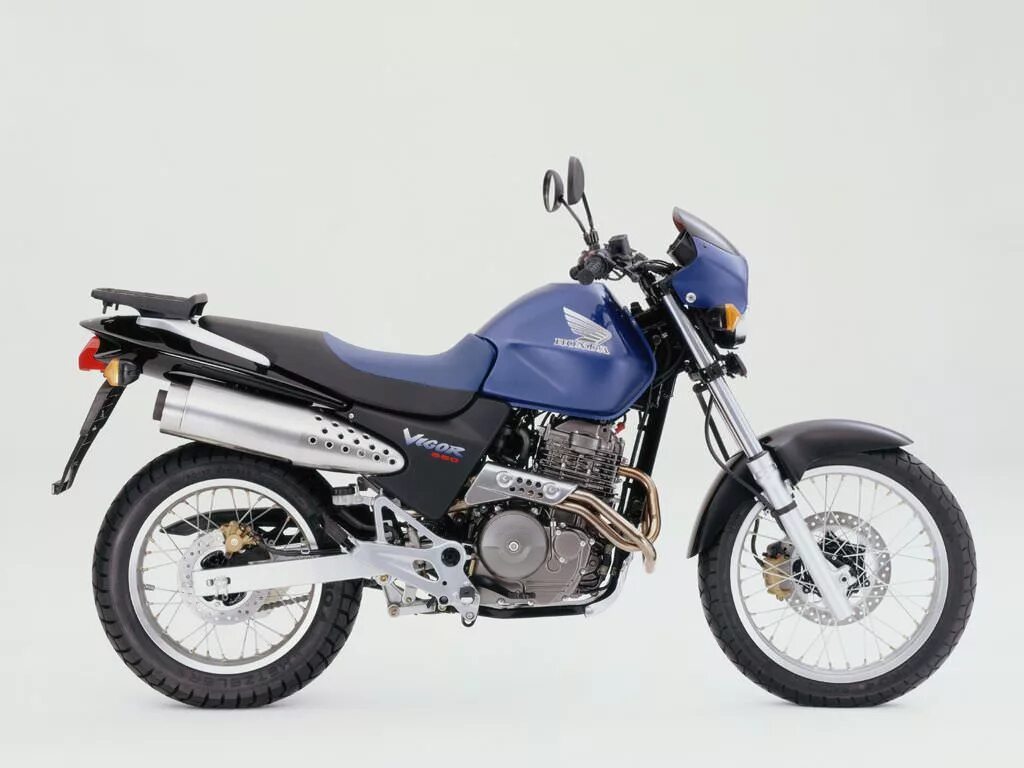 Мотоцикл хонда 650. Honda FX 650 Vigor. Honda Vigor 650. Suzuki FX 650. Мотоцикл Honda 650 кубов.