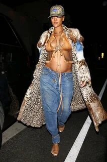 PICS: Rihanna bares baby bump in revealing 2000s-inspired outfit.